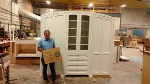 John Ianiri, founder and president of Fairfield County Millwork, proudly displays the first-place plaque for best Commercial project in the 2015 PureBond Quality Awards competition.